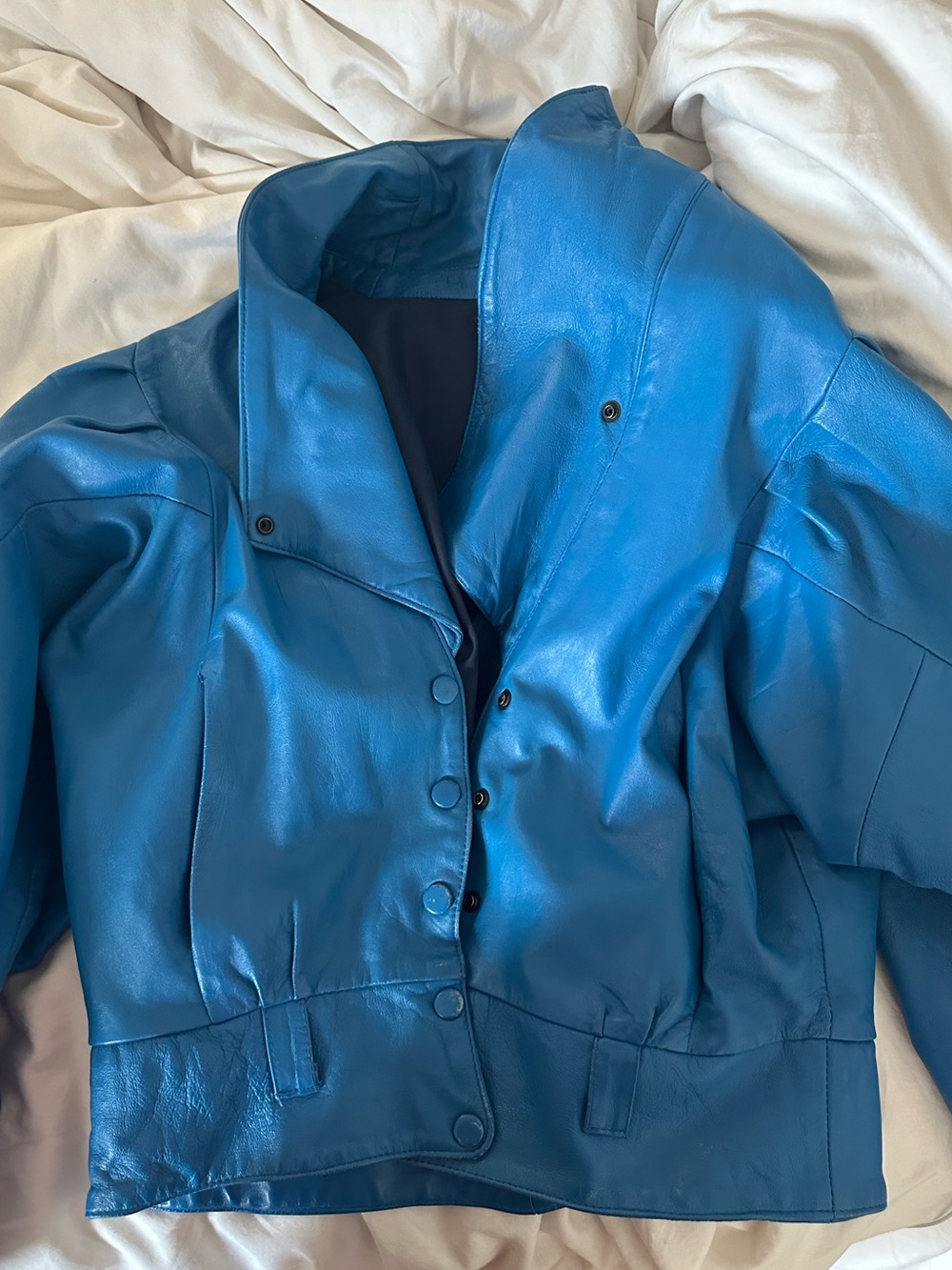 Electric blue women’s leather bomber jacket